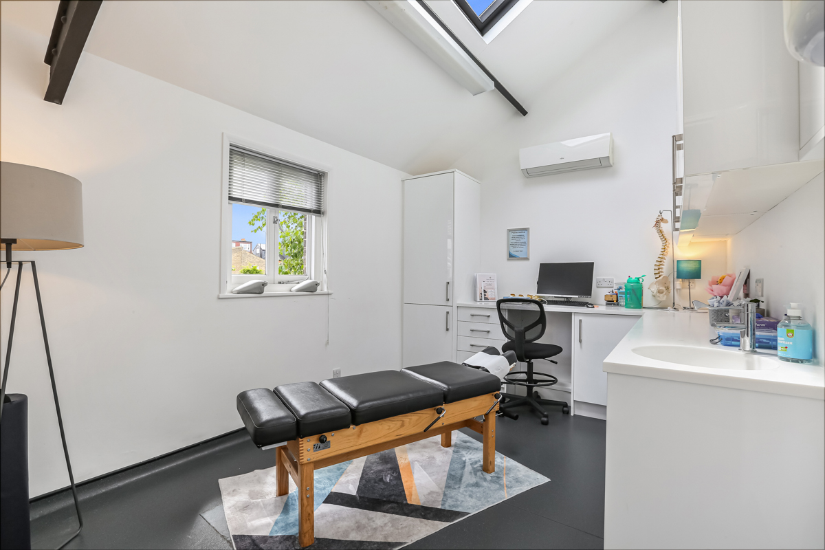 Chiropractic treatment room at Kingston Chiropractic & Wellness Centre